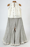 Dola Silk Top with Faux Mirror Embroidery embellished with Tassels paired with tissue Palazzo