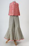 Dola Silk Top with Faux Mirror Embroidery embellished with Tassels paired with tissue Palazzo
