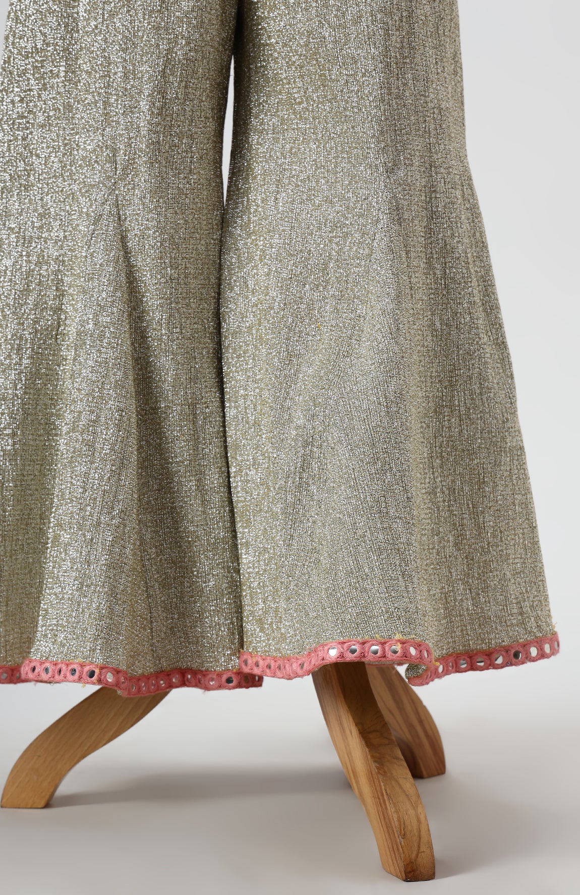Dola Silk Top with Faux Mirror Embroidery embellished with Tassels paired with tissue Palazzo