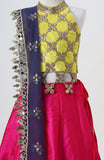 Raw silk blouse with faux mirror lace detailing and organza lehnga with gota detailing and mirrorwork border alongwith a soft net emb dupatta with pearl emb border
