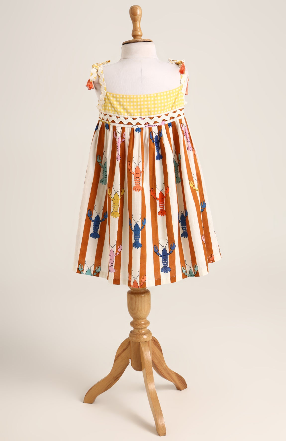 Lobster colourful print sleeveless dress. Detailed with lace trims on shoulder straps