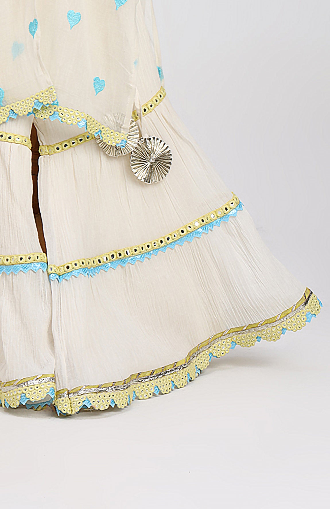 Sky-blue embroidered hearts on off white chanderi kurta with front slit and off white crushed cotton Sharara