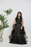 BLACK SATIN EMBOIDERED GOWN WITH DETACHABLE  RUFFLE DRAPE