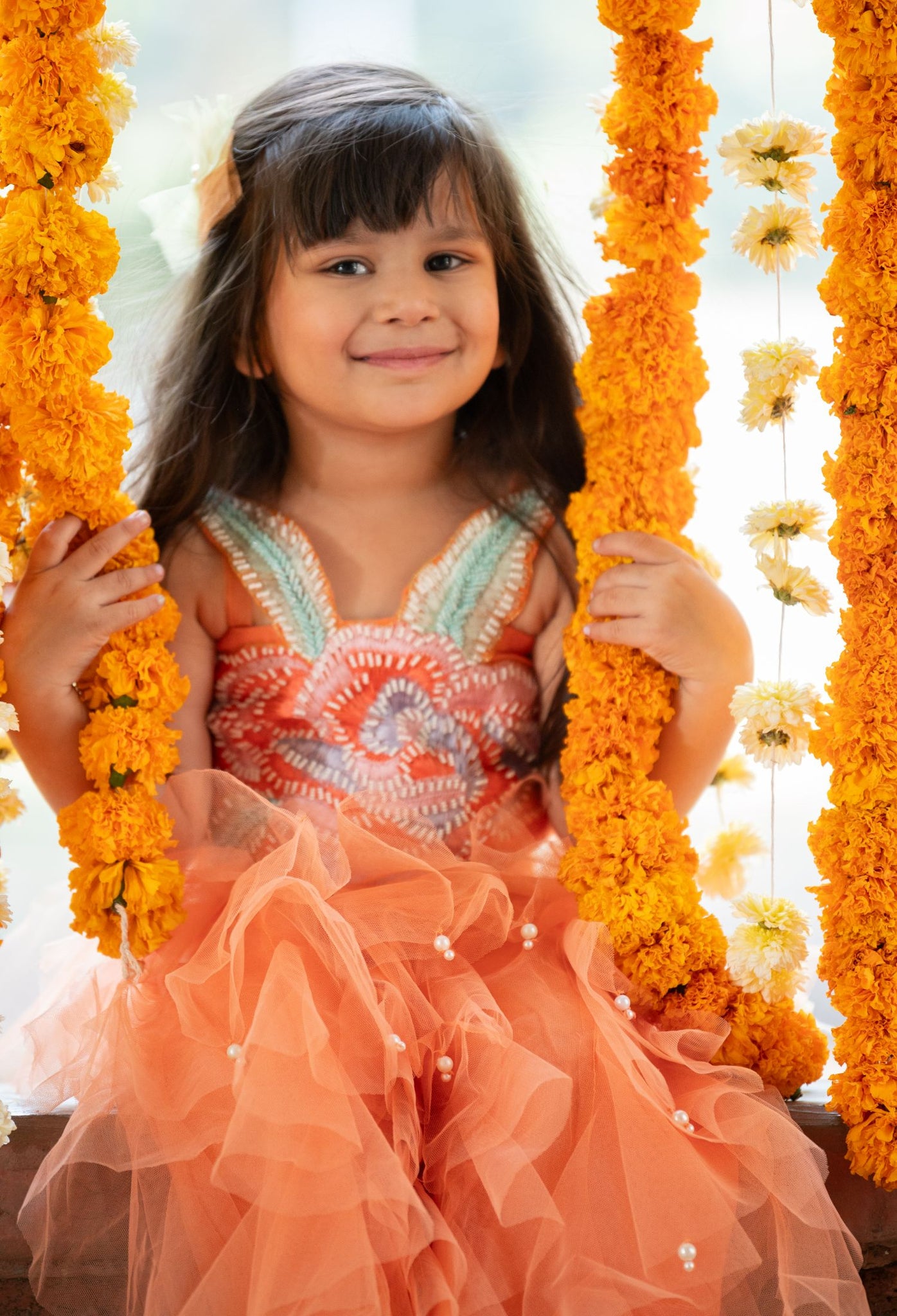 Vibrant Orange tulle style dress with flower embroidery on top