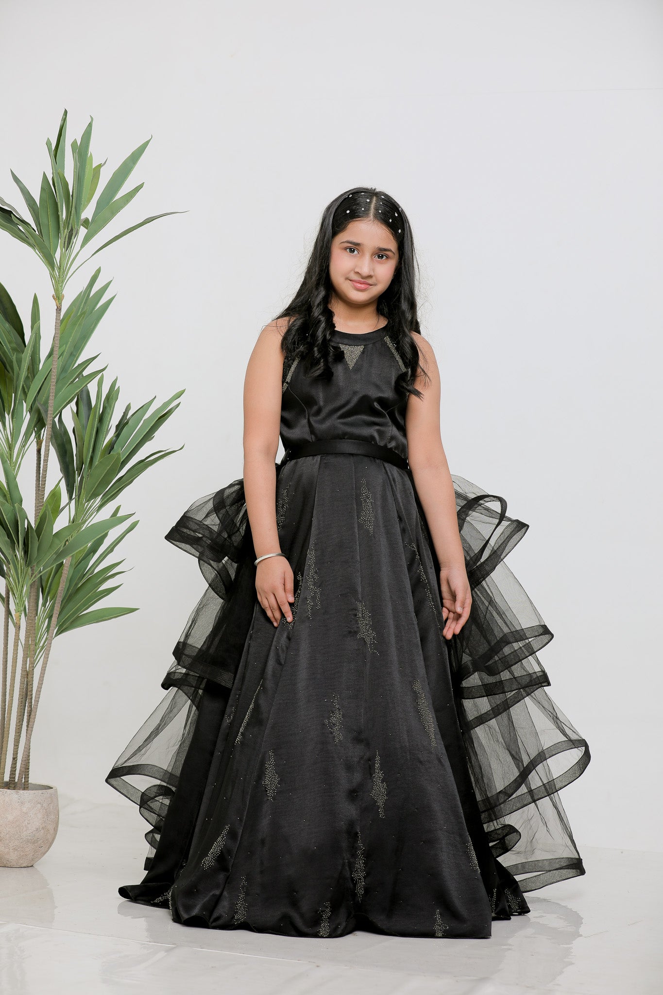 BLACK SATIN EMBOIDERED GOWN WITH DETACHABLE  RUFFLE DRAPE