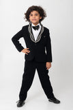 BOLD AND VERY FANCY CONTRAST BLACK AND WHITE  PIPING DETAILING ON COLLAR. TUXEDO IN BLACK
