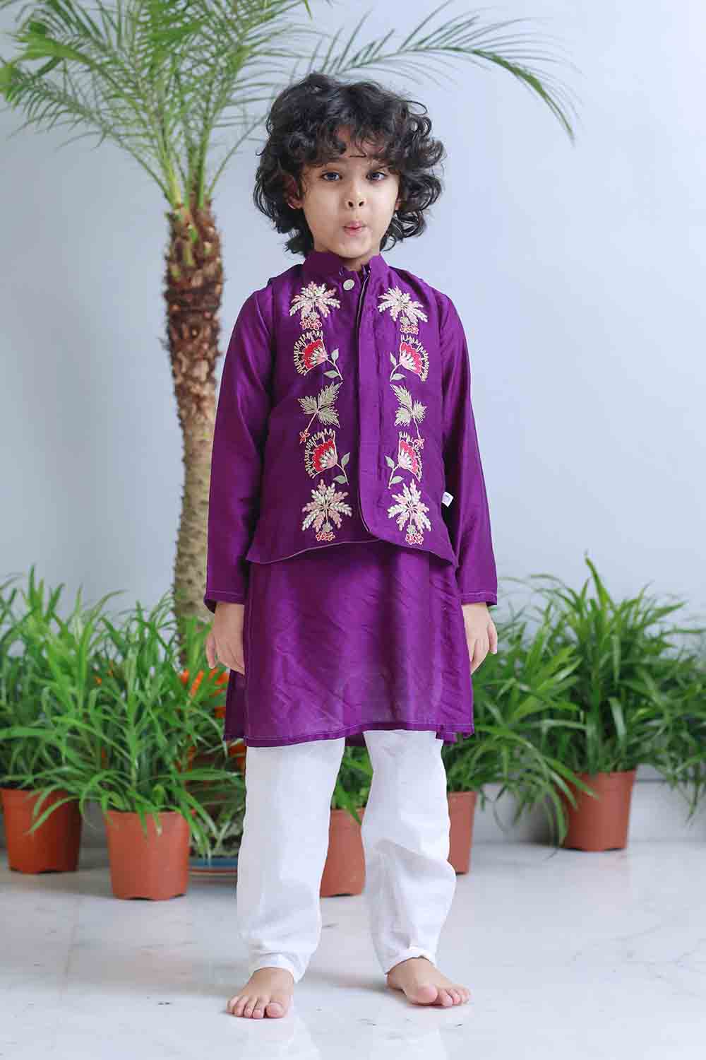 Traditional piurple embroidered kurta set
