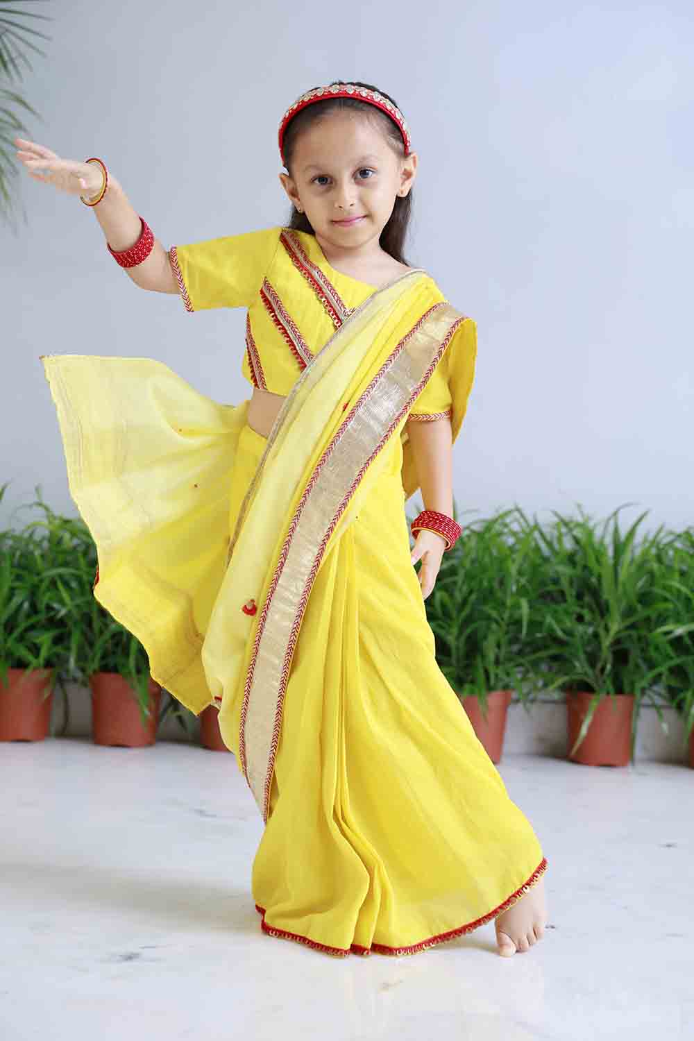 Shaded yellow pre draped sari