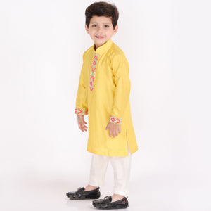 Yellow Knot Embroidered Kurta Churidaar