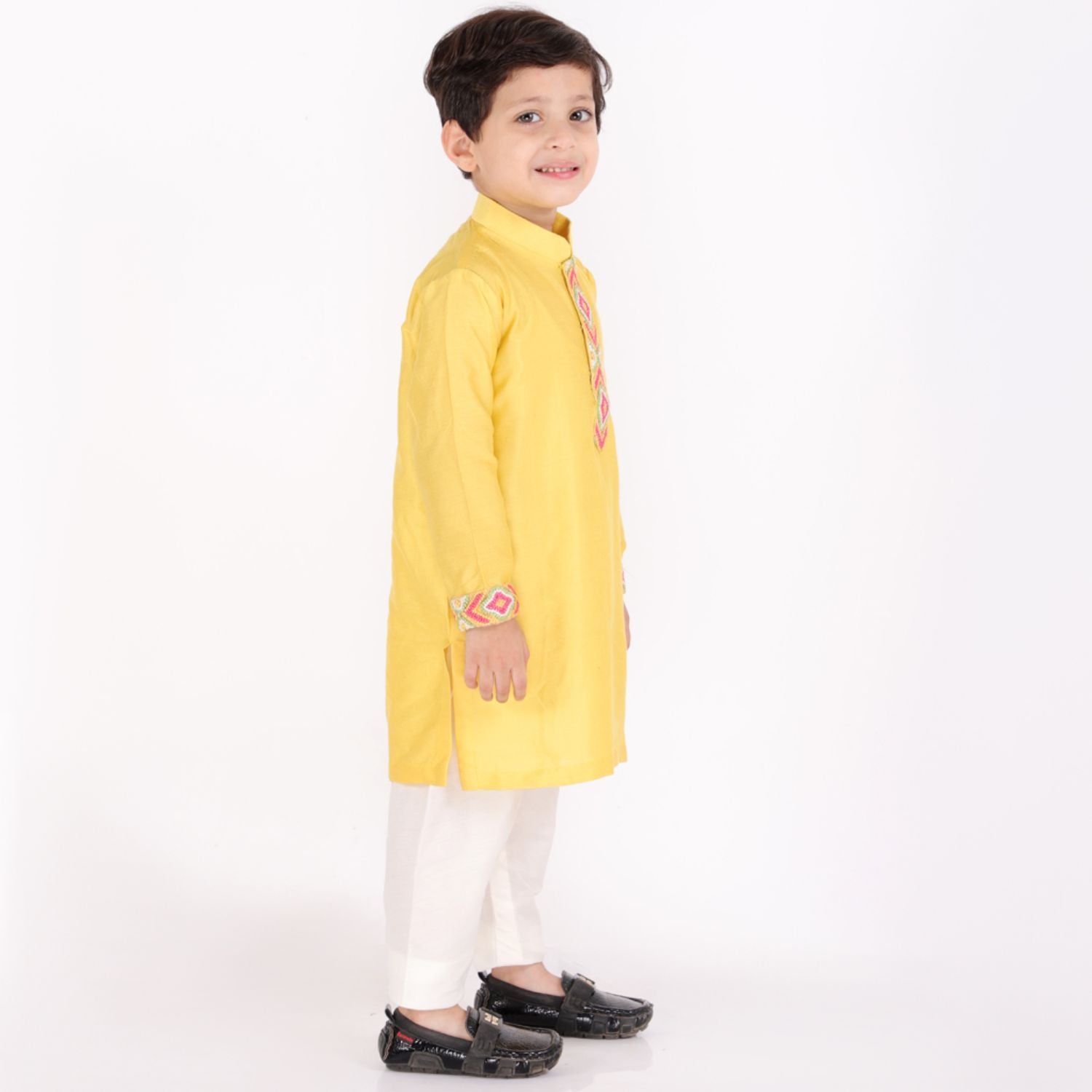 Yellow Knot Embroidered Kurta Churidaar