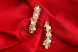 Pair Of Amber In Pearl Hairclips White And Golden