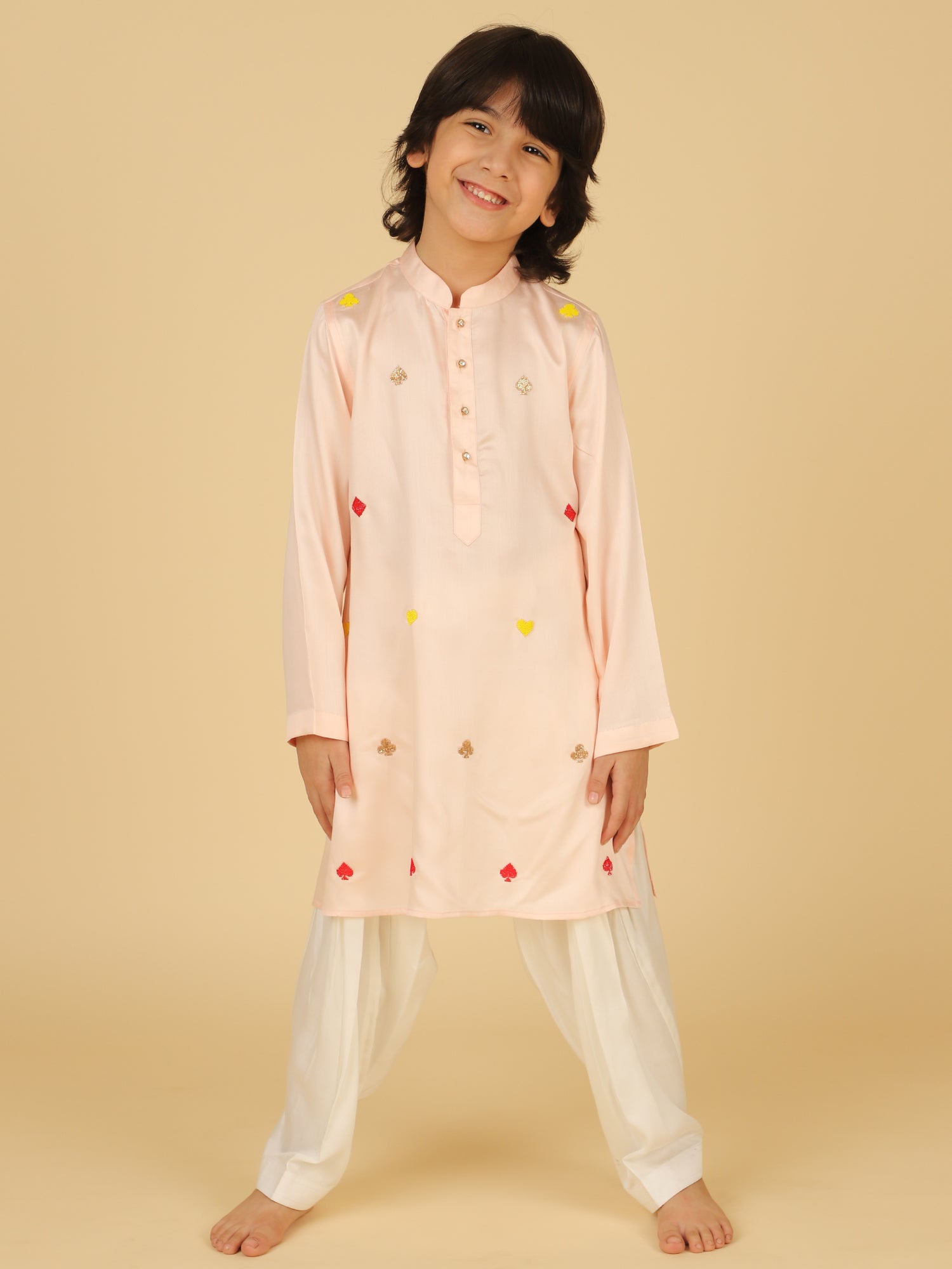 PEACH KURTA WITH ALL OVER EMBROIDERY AND SHALWAR