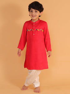 RED KURTA WITH CHEST EMBROIDERY AND SHALWAR